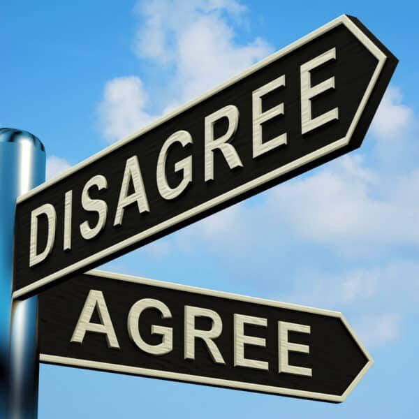 Disagree Or Agree Directions On A Metal Signpost